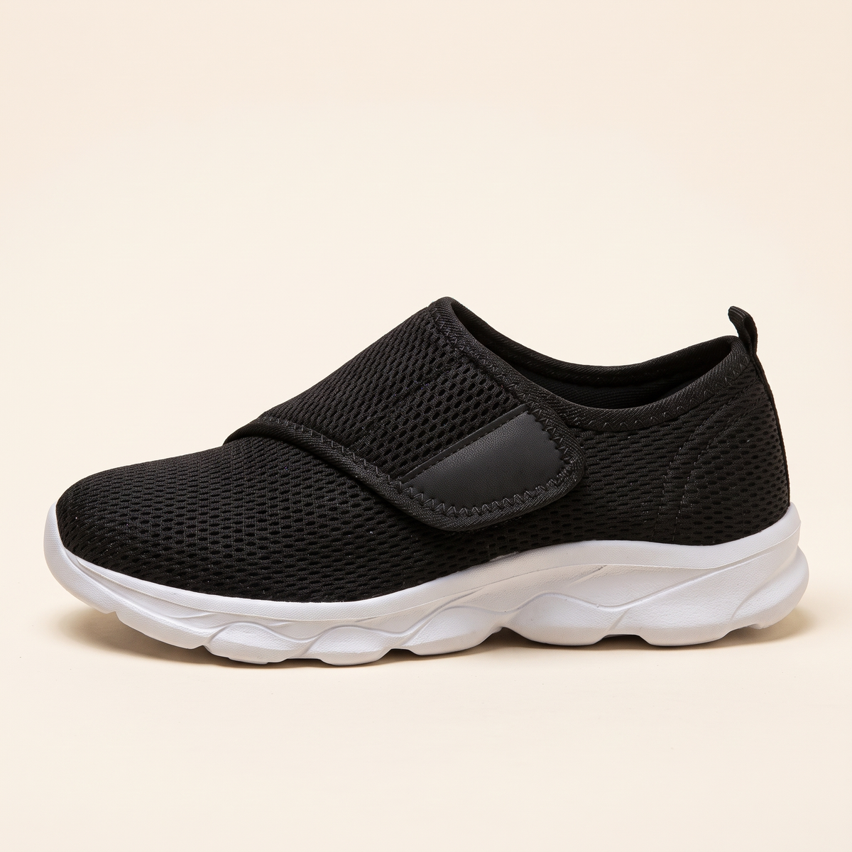 The Easy-Strap in black with white sole, side view